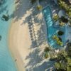 Aerial of beach and Pool at COMO Maalifushi, Maldives